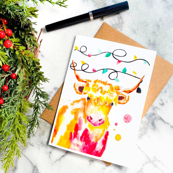 Carte vache de Noël illuminée