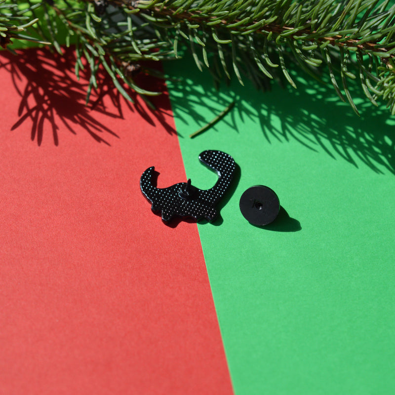 Épinglette Dino d’hiver