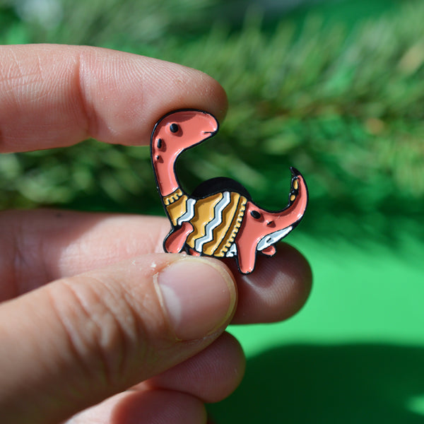 Épinglette Dino d’hiver