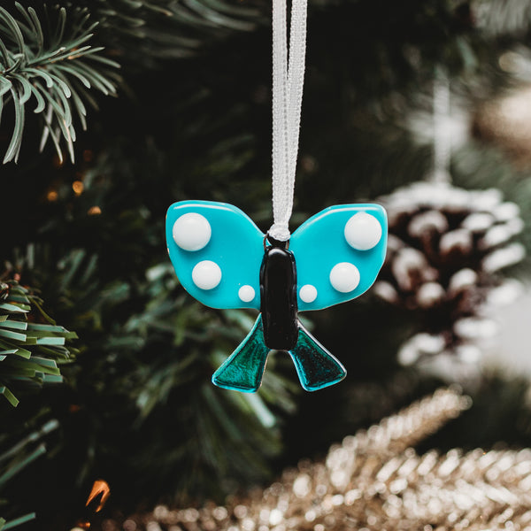 papillon en verre turquoise translucide à suspendre