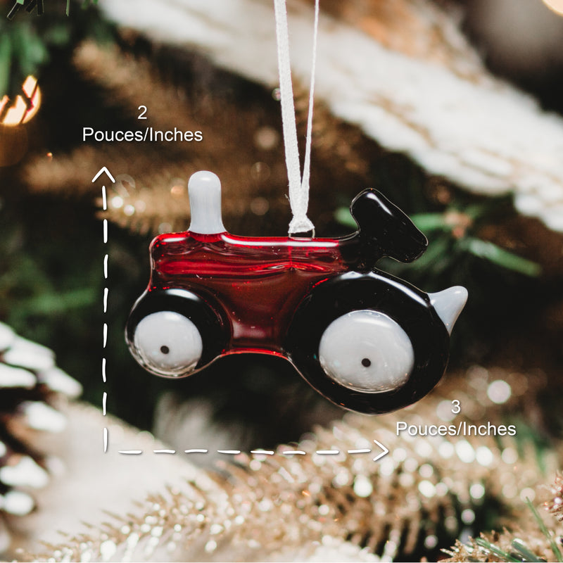 boule de verre pour noel en forme de tracteur rouge